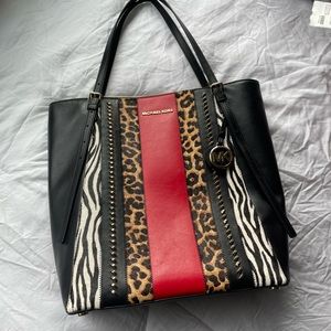 Michael Kors animal print travel bag/ work tote and matching purse